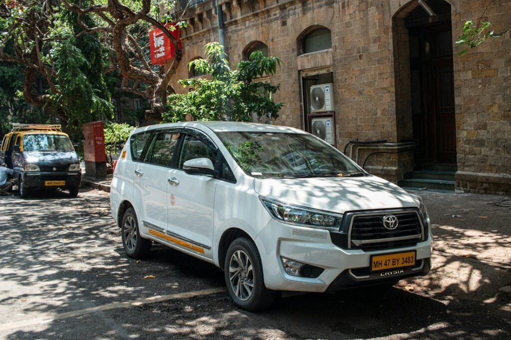 Clean white Innova cab ready for pickup in Kolhapur